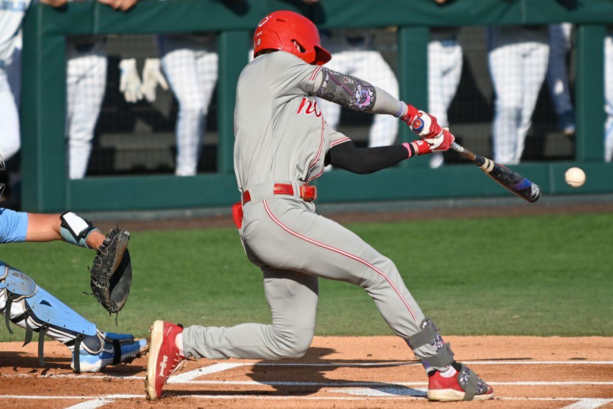 Sophomore infielder Luke Nixon hits the ball during the game against UNC at Boshamer Stadium on Friday, May 9, 2025. Nixon had two hits. NC State beat UNC 8-5.