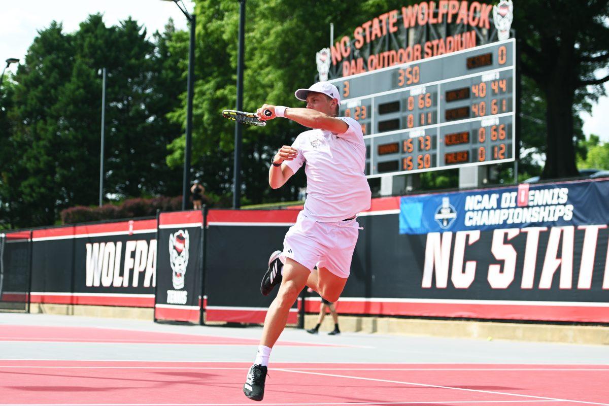 Senior Fons Van Sambeek follows through during the NCAA first round match versus South Carolina State at J.W. Isenhour Tennis Center on Saturday, May 3, 2025. Manning and Van Sambeek won their doubles match 6-0. The Wolfpack beat the Bulldogs 4-0.