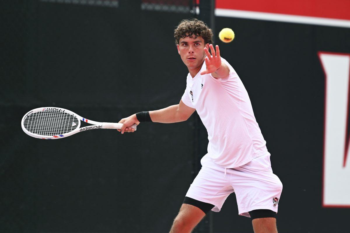 Redshirt freshman Jules Leroux watches the ball during the NCAA first round match versus South Carolina State at J.W. Isenhour Tennis Center on Saturday, May 3, 2025. Leroux won his singles match 2-0 (6-4, 6-2). The Wolfpack beat the Bulldogs 4-0.